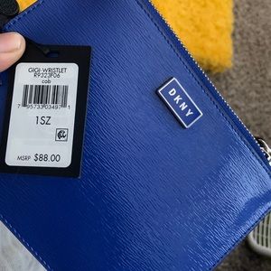 Nipsey blue Dkny wristlet